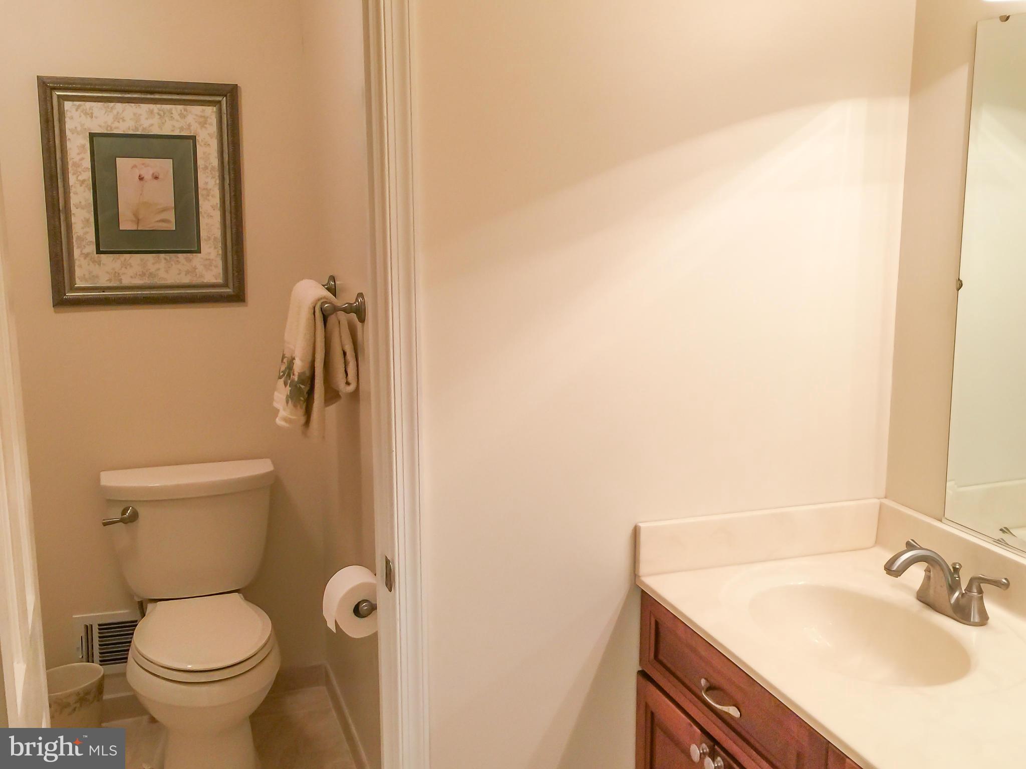 11423 Running Cedar Road Reston, VA 20191 - Photo 24 of 28 a bathroom with a sink toilet and vanity