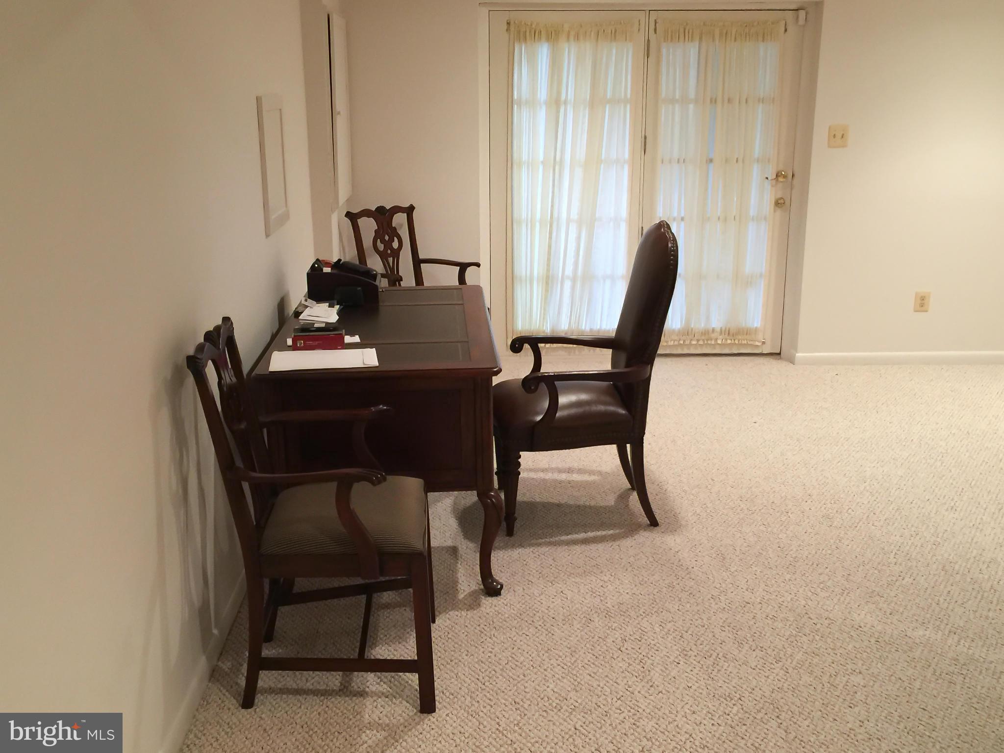 11423 Running Cedar Road Reston, VA 20191 - Photo 25 of 28 a dining room with furniture and a window