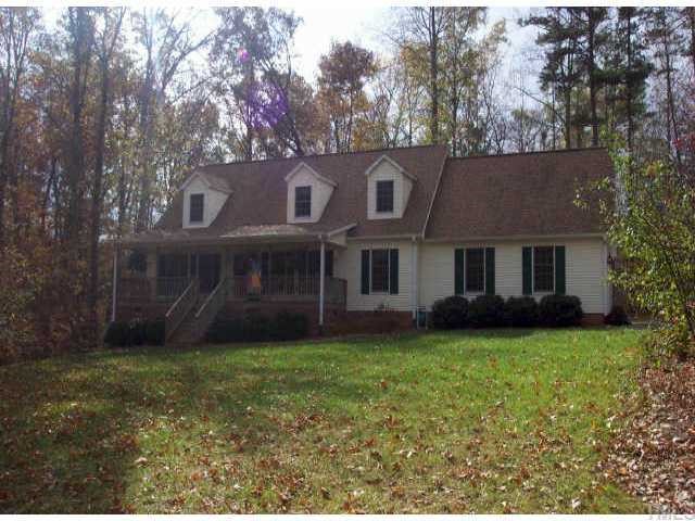 251 Shannon Road Timberlake, NC 27583 - Photo 1 of 1 a view of a yard in front of the house