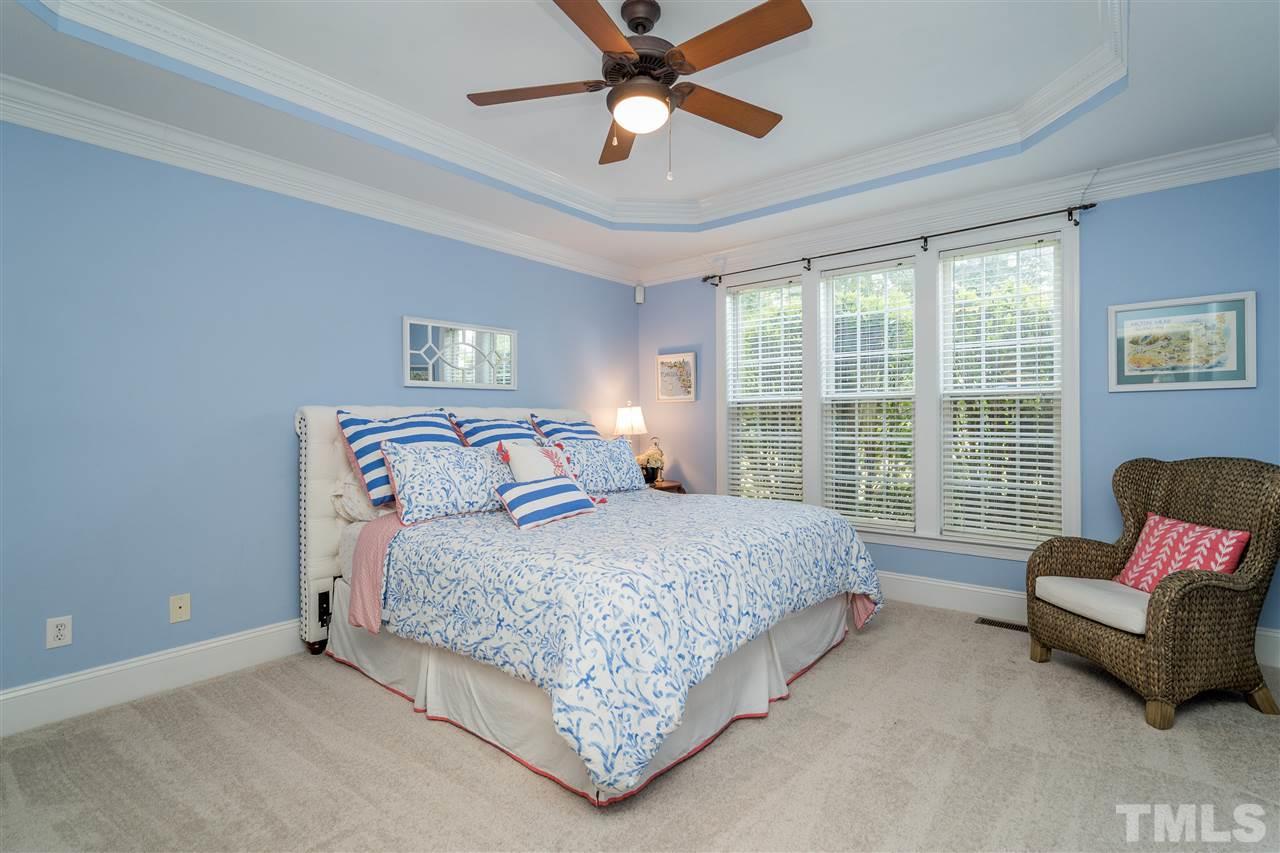 275 Waterville Street Raleigh, NC 27603 - Photo 14 of 30 a bedroom with a bed and window