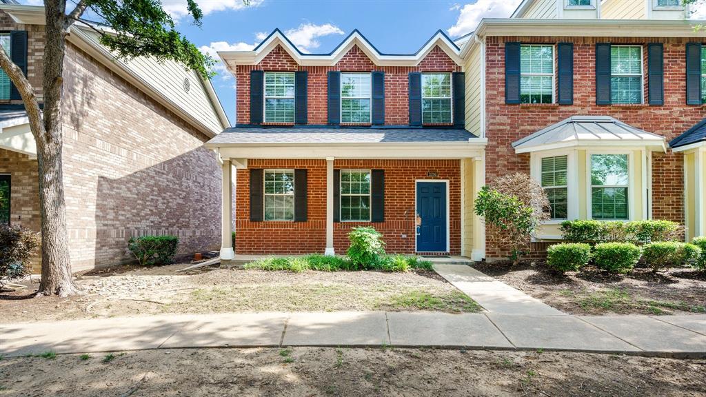 3206 Bedford Road Bedford, TX 76021 - Photo 2 of 26 a front view of a house with garden