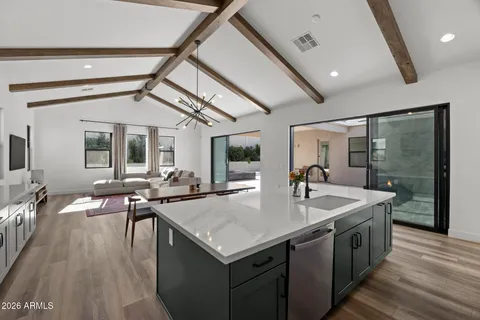 a bathroom with a sink toilet and a mirror