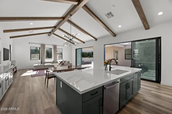 a bathroom with a sink toilet and a mirror
