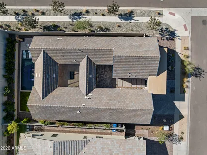 an aerial view of residential house with outdoor space