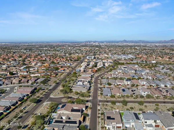 an aerial view of residential house and green space