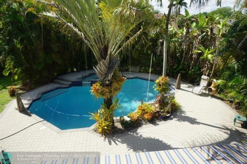 Private back yard - pool with spill over spa, lushly landscaped, perfect for entertaining