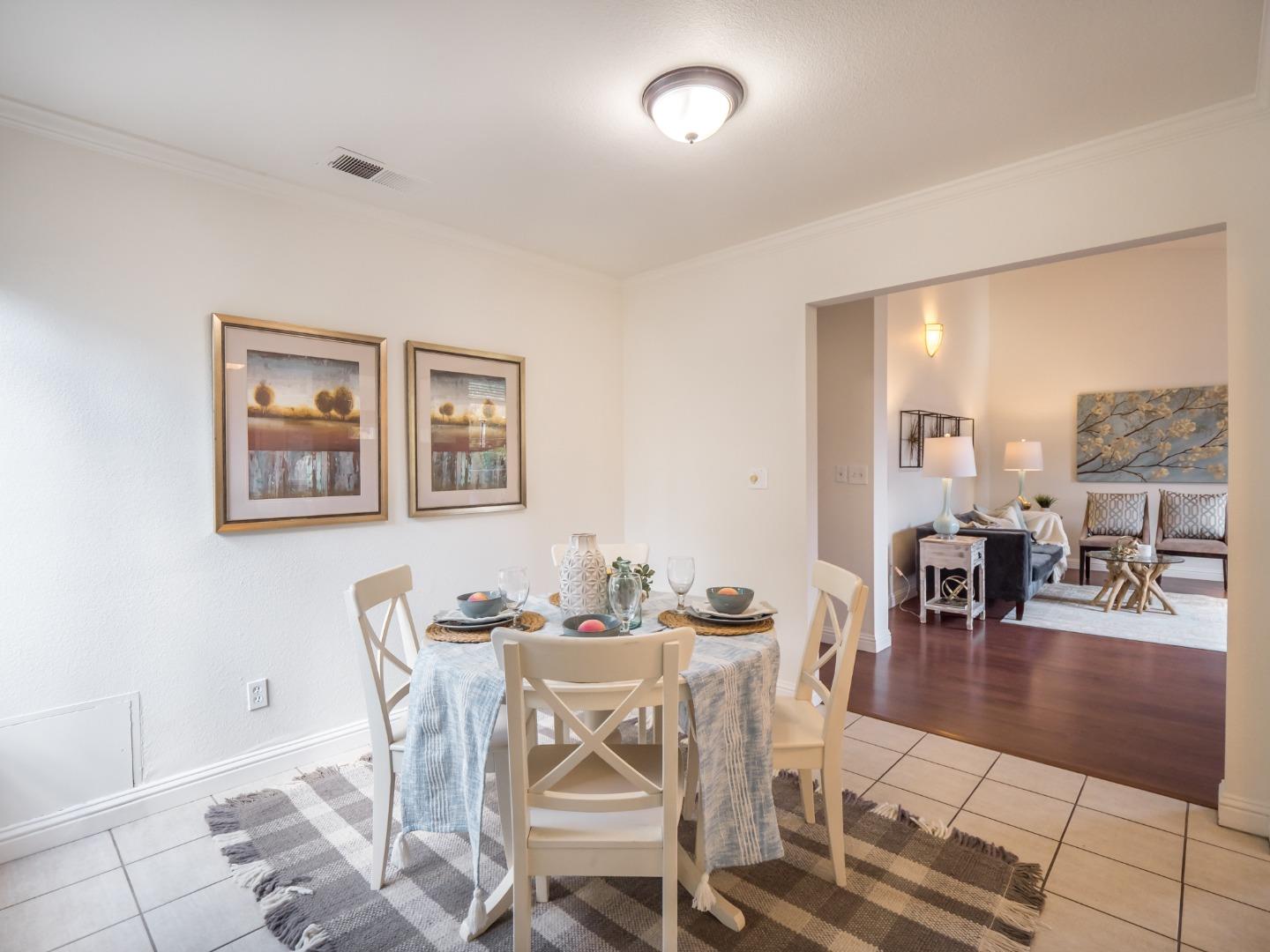 280 Marlin Court Aptos, CA 95003 - Photo 2 of 43 a dining room with furniture and wooden floor