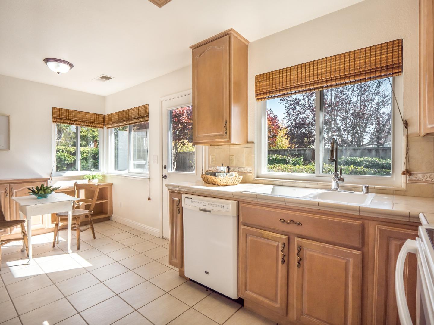 280 Marlin Court Aptos, CA 95003 - Photo 16 of 43 a kitchen with cabinets and sink