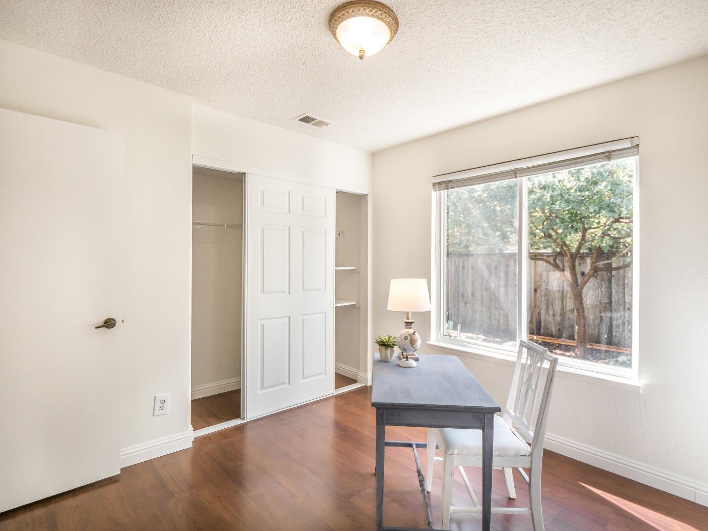 280 Marlin Court Aptos, CA 95003 - Photo 21 of 43 a view of a room with furniture and wooden floor