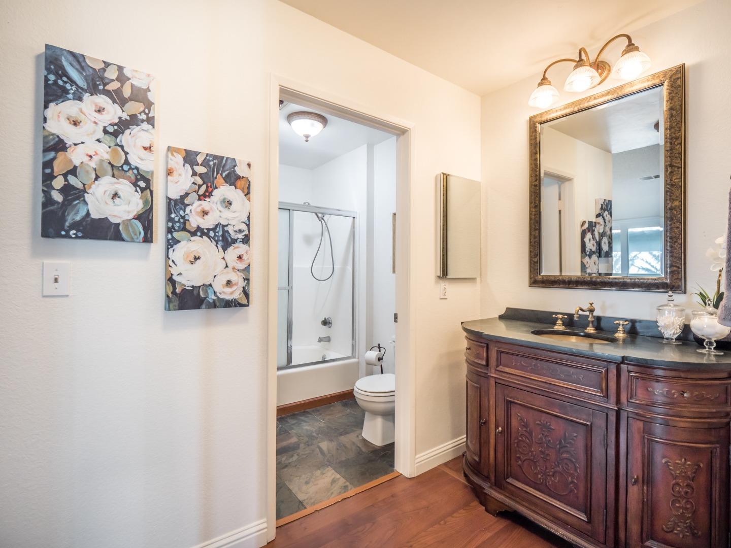 280 Marlin Court Aptos, CA 95003 - Photo 24 of 43 a bathroom with a toilet sink and mirror