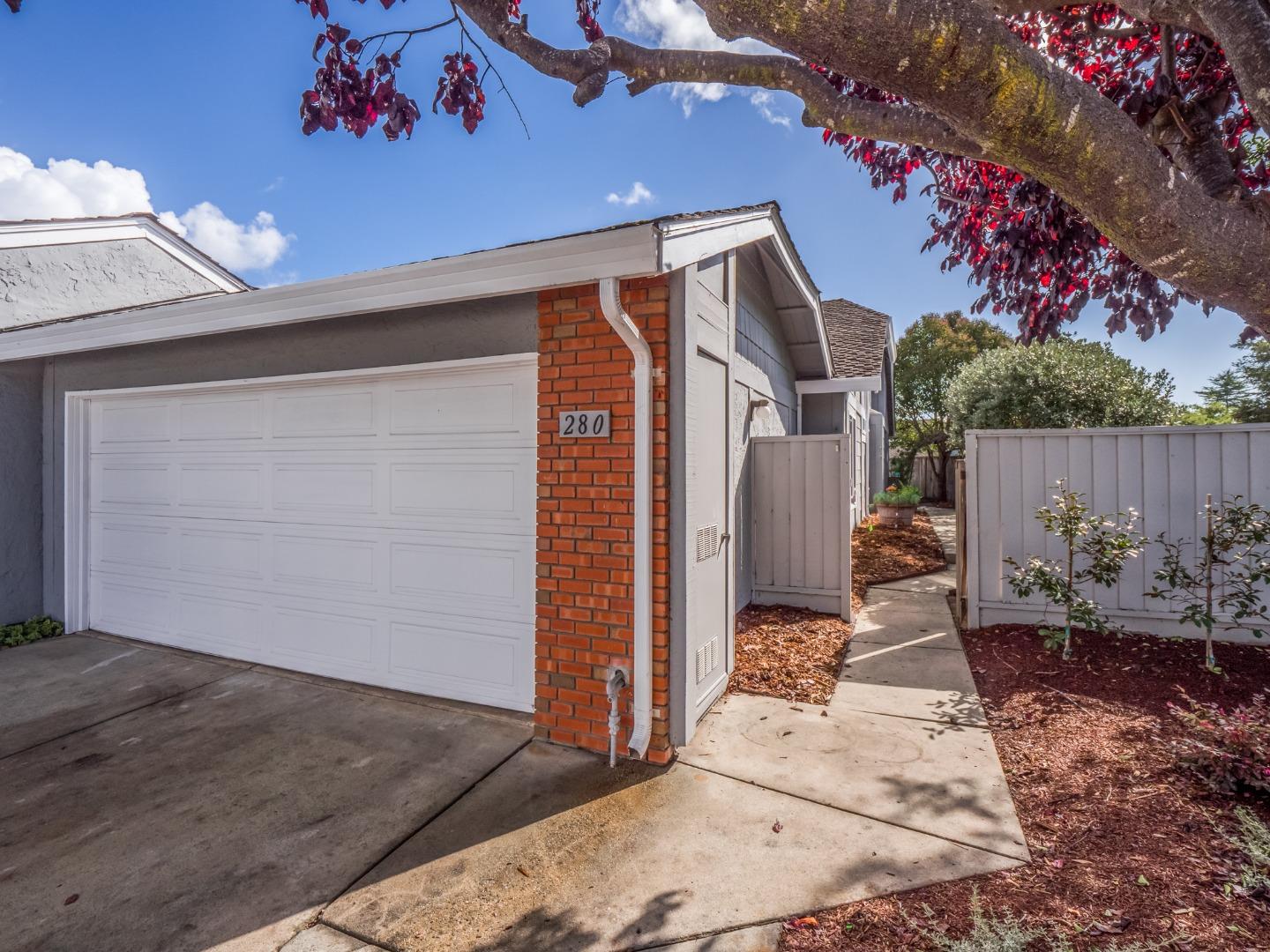 280 Marlin Court Aptos, CA 95003 - Photo 31 of 43 a backyard of a house with seating space