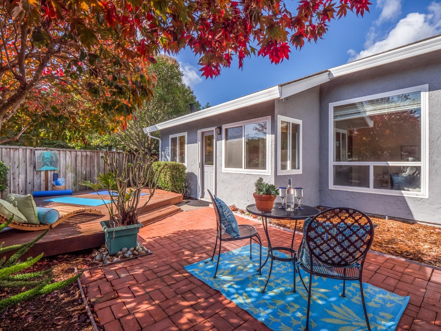 280 Marlin Court Aptos, CA 95003 - Photo 41 of 43 a backyard of a house with outdoor seating