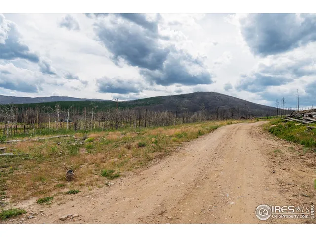 a view of a lake with a mountain