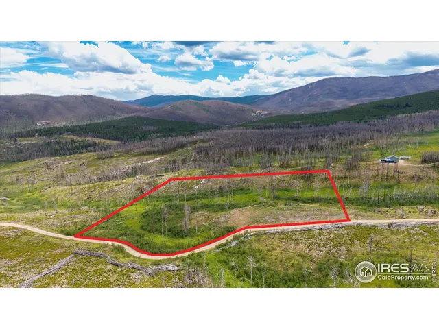 a view of swimming pool with a mountain