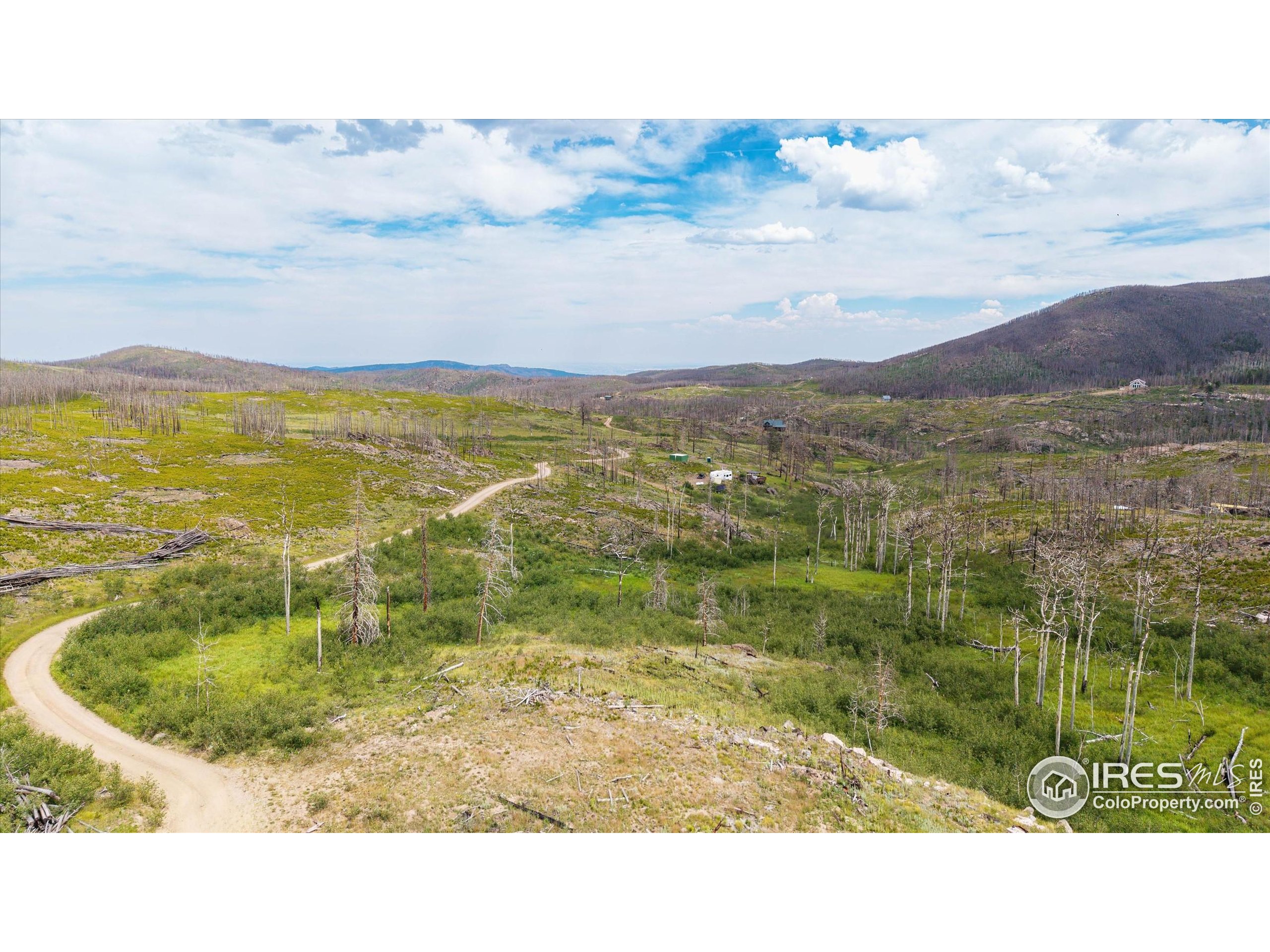 529 Quartz Road Bellvue, CO 80512 - Photo 19 of 31 a view of an aerial view of residential houses with outdoor space and ocean