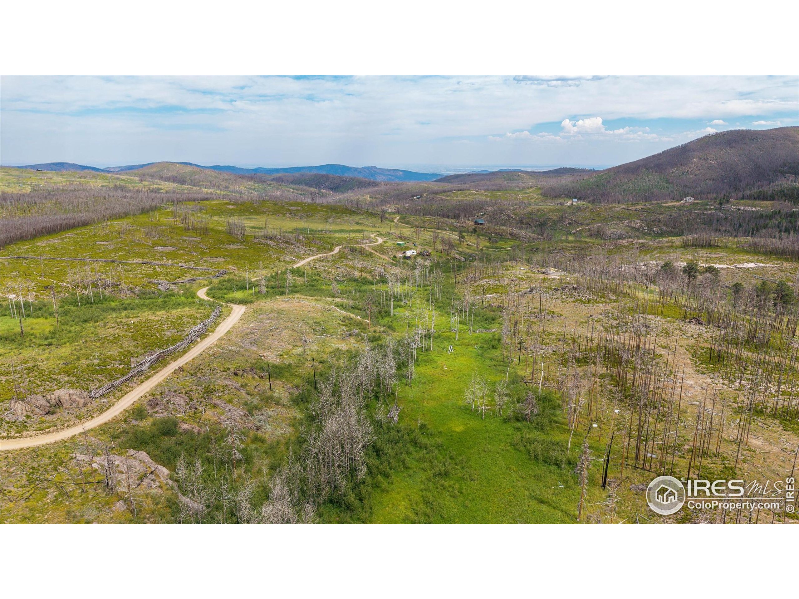 529 Quartz Road Bellvue, CO 80512 - Photo 23 of 31 a view of an aerial view of residential houses with outdoor space