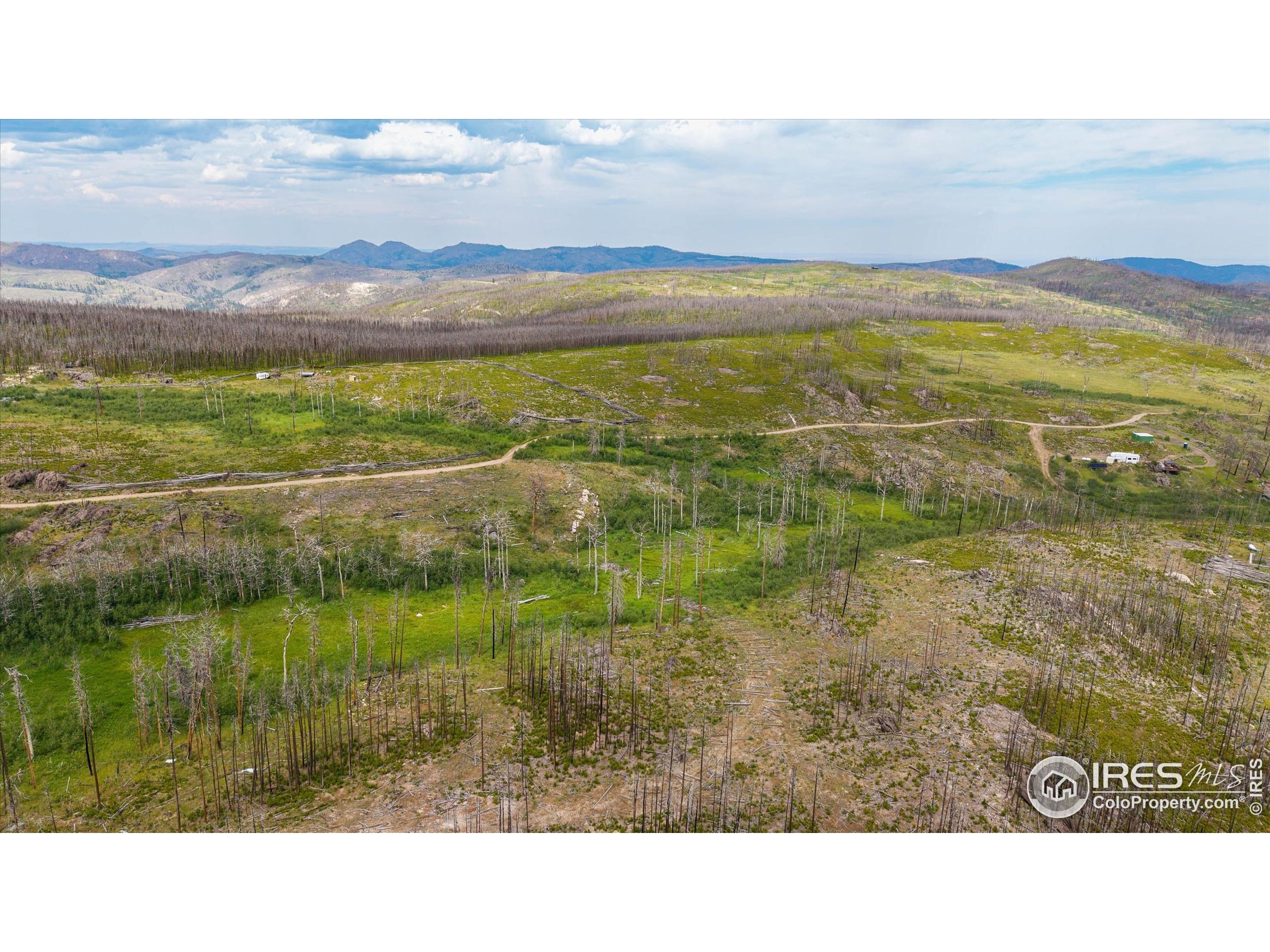 529 Quartz Road Bellvue, CO 80512 - Photo 24 of 31 a view of lake with mountain