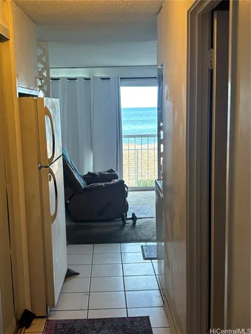 a living room with a couch and a shower