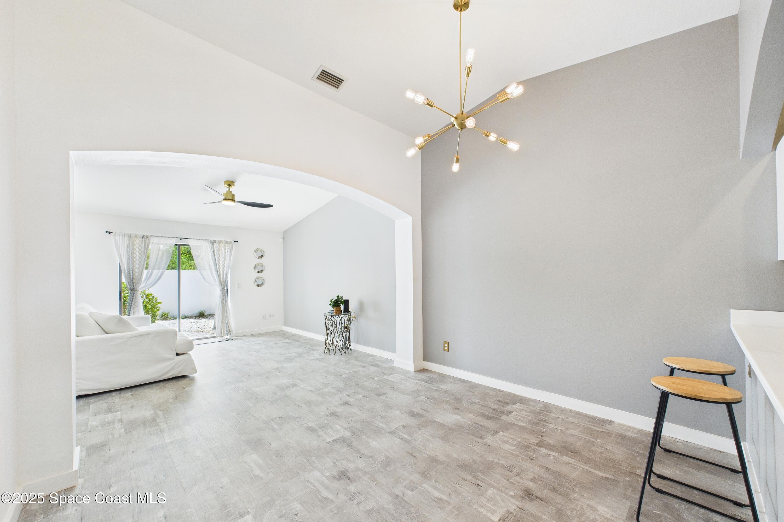 1010 Luminary Circle, Unit 104 Melbourne, FL 32901 - Photo 16 of 42 a view of an empty room with a window