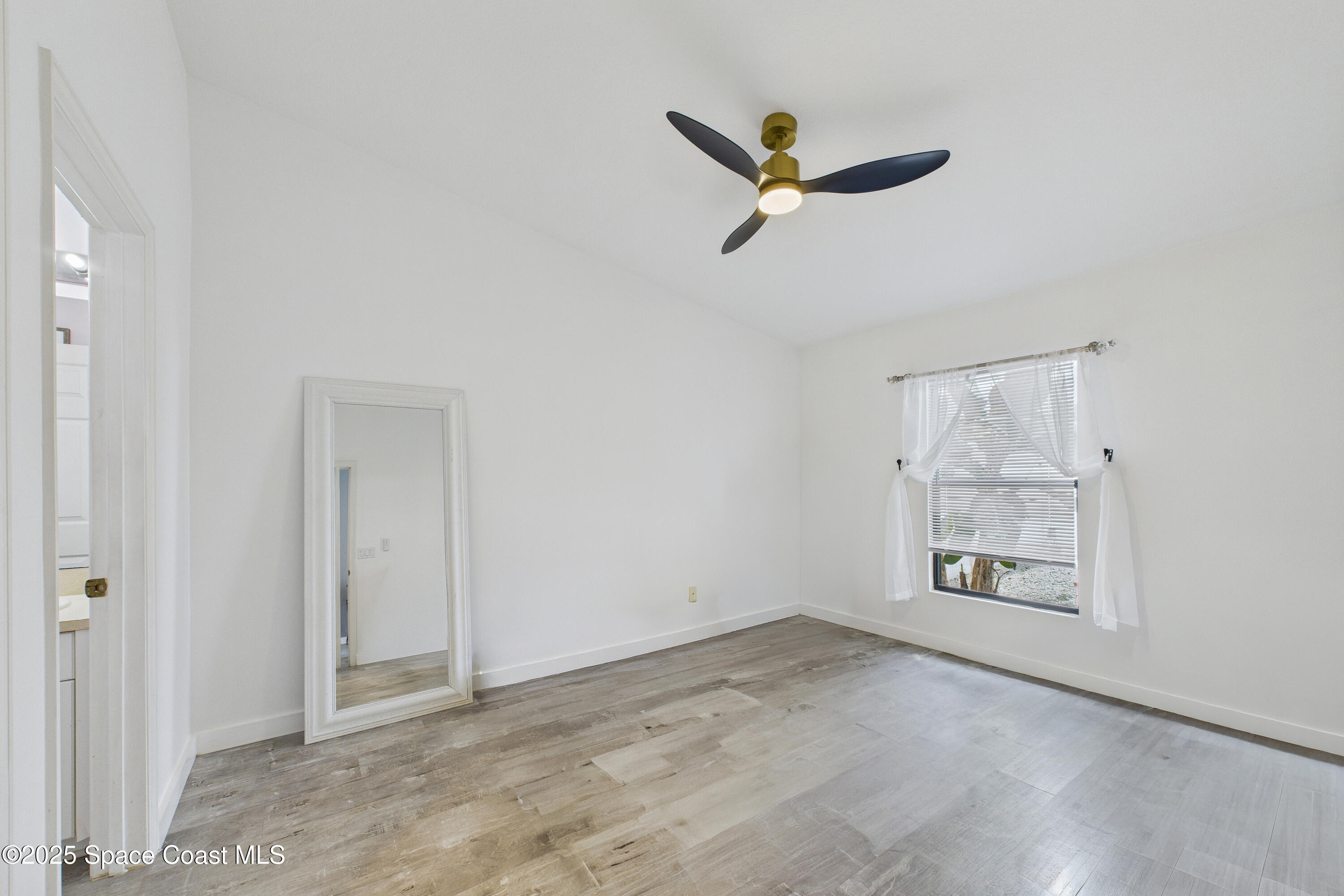 1010 Luminary Circle, Unit 104 Melbourne, FL 32901 - Photo 24 of 42 a view of an empty room