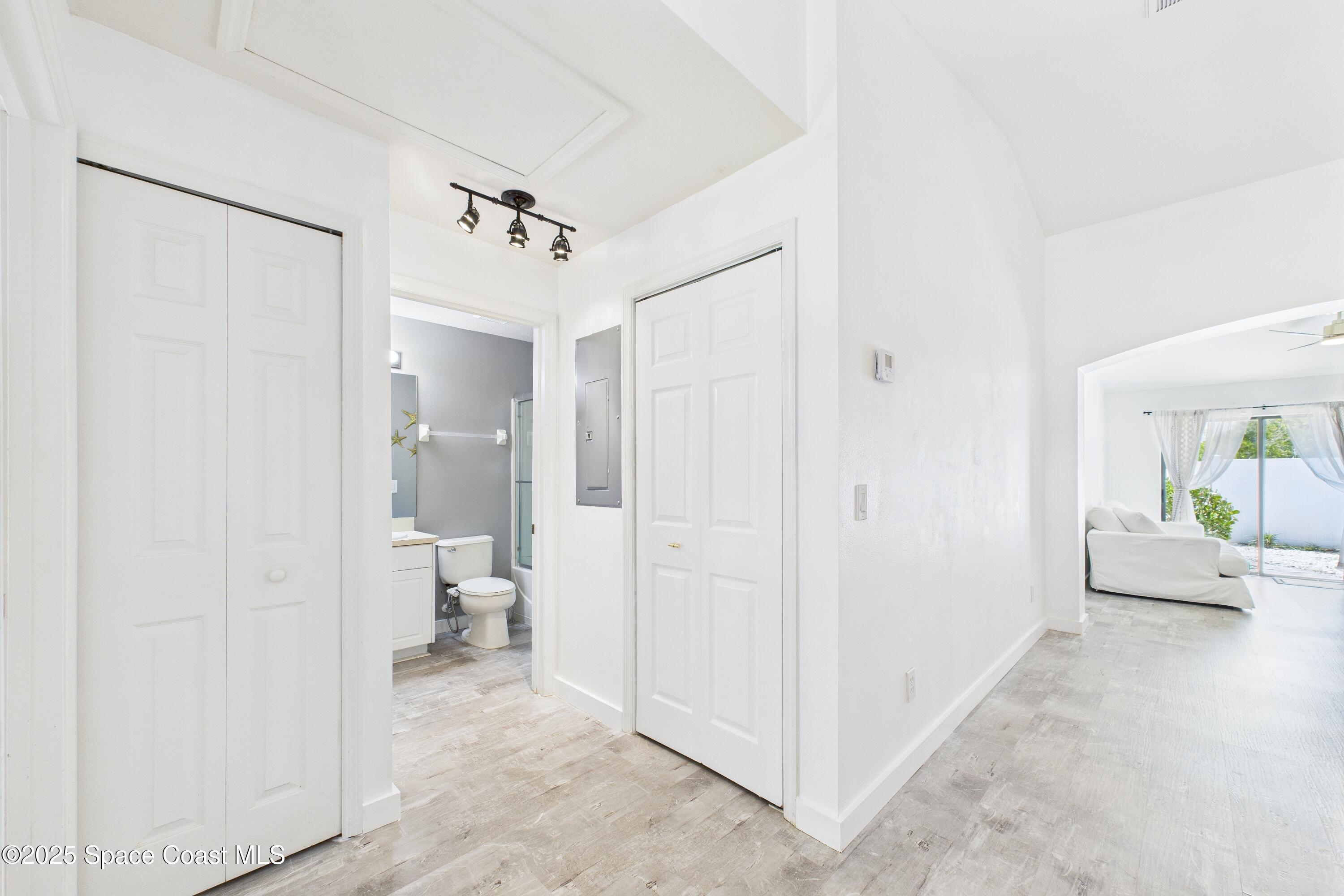 1010 Luminary Circle, Unit 104 Melbourne, FL 32901 - Photo 33 of 42 a view of a bathroom with a shower and a toilet