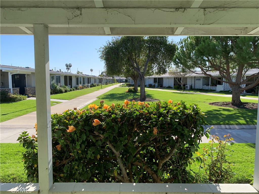 1641 Monterey Road Seal Beach, CA 90740 - Photo 4 of 9 a view of a garden with a small house