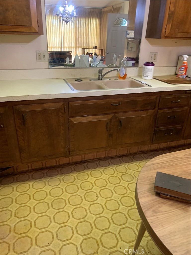 1641 Monterey Road Seal Beach, CA 90740 - Photo 7 of 9 a bathroom with a sink and a mirror