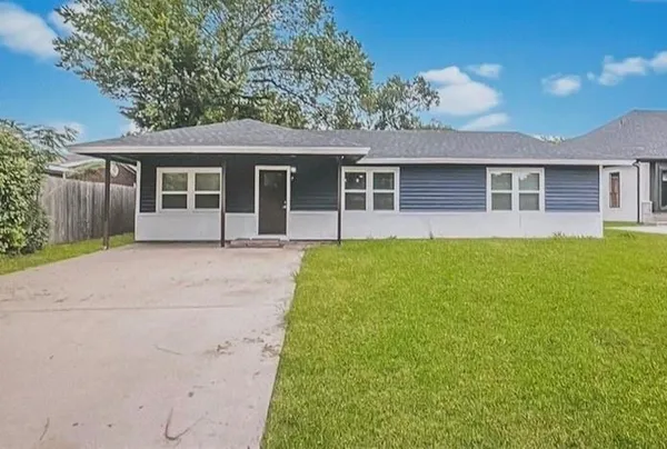 front view of a house and a yard