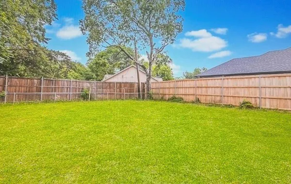 a view of a backyard with a garden