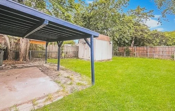 a house view with a garden space