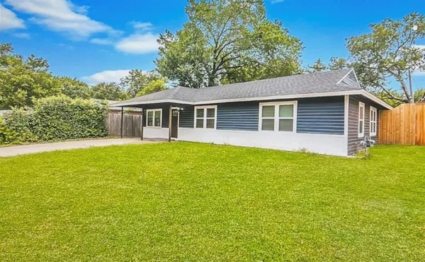 a house view with a garden space
