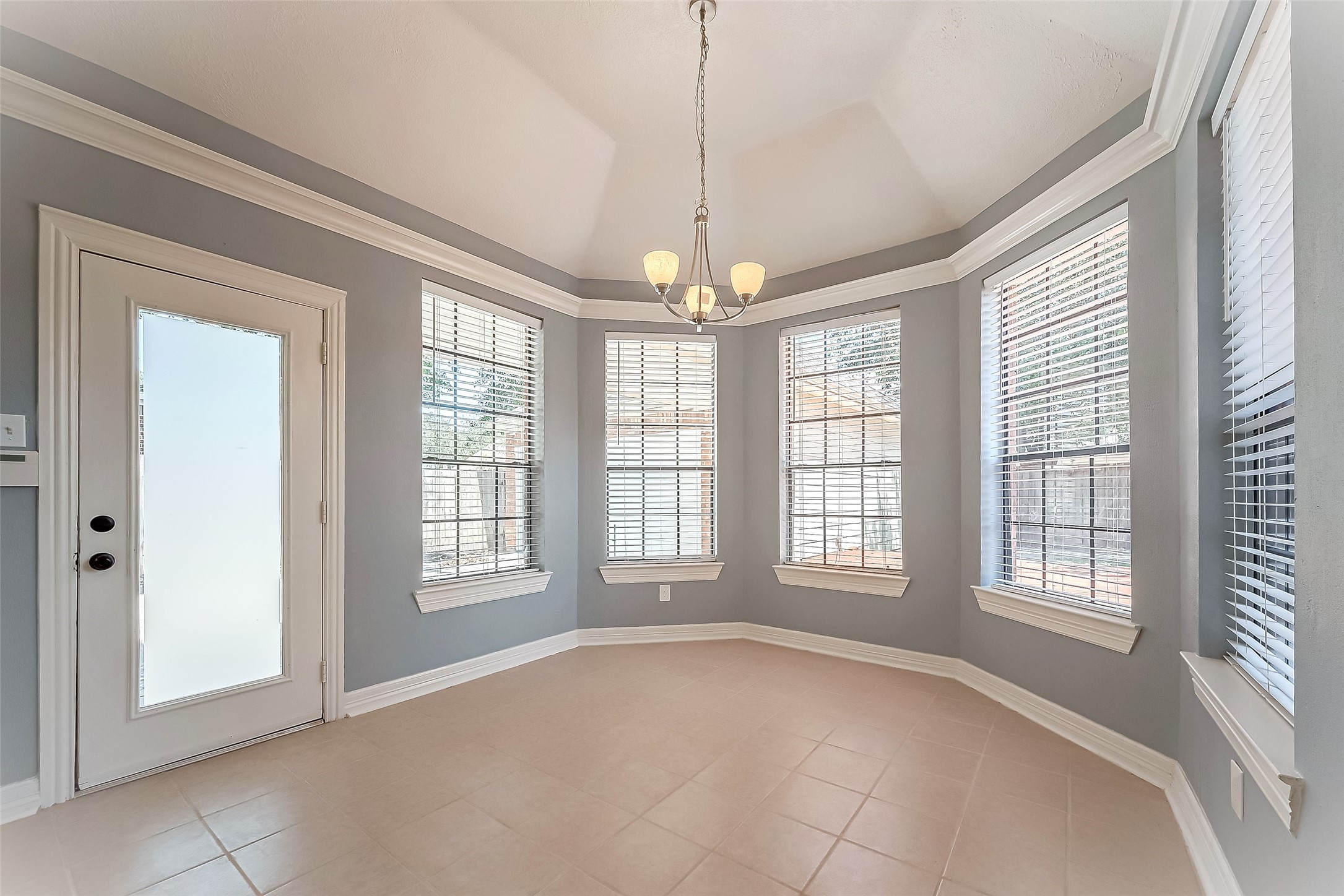 16018 Conners Ace Drive Spring, TX 77379 - Photo 19 of 47 a view of an empty room with windows