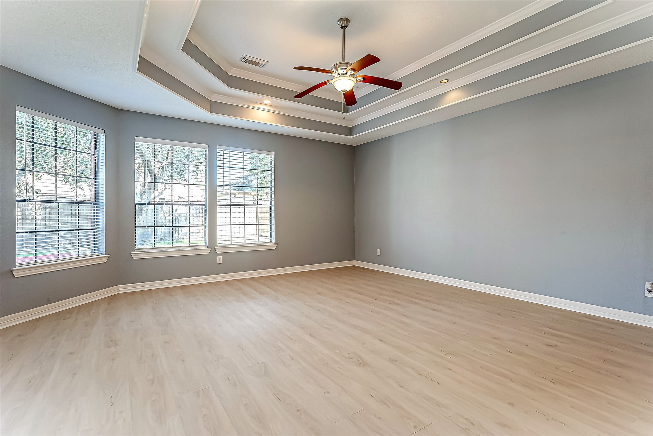16018 Conners Ace Drive Spring, TX 77379 - Photo 21 of 47 a view of an empty room with wooden floor and a window