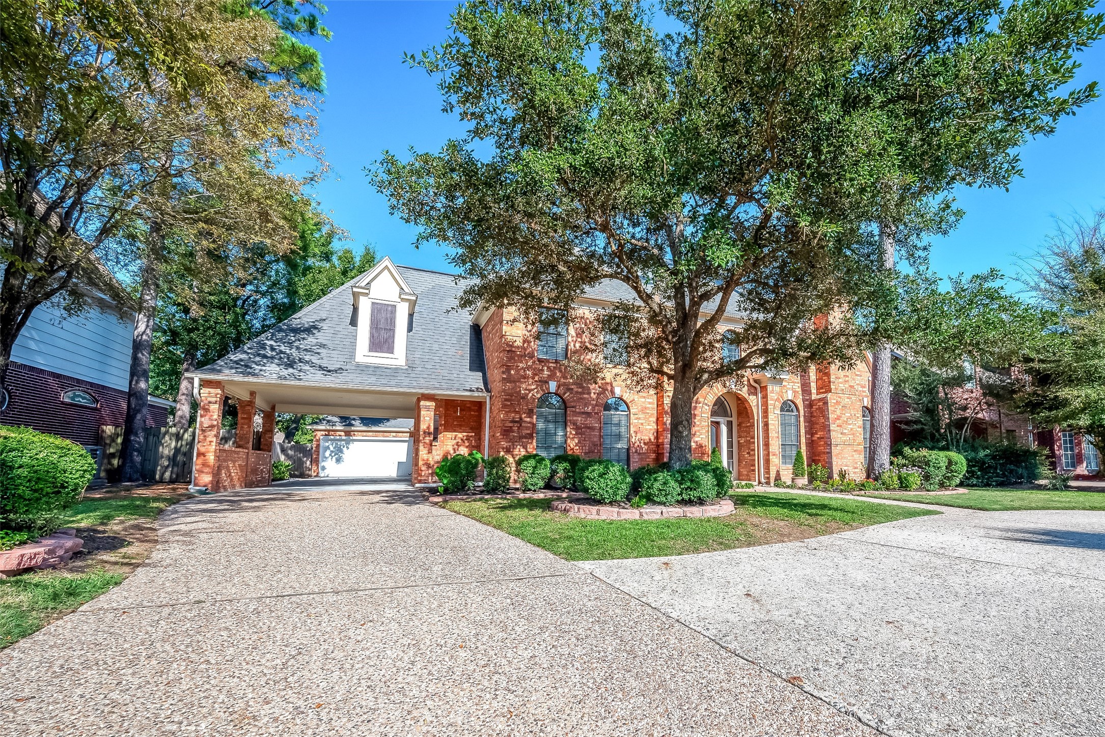 16018 Conners Ace Drive Spring, TX 77379 - Photo 3 of 47 a front view of house with yard and green space