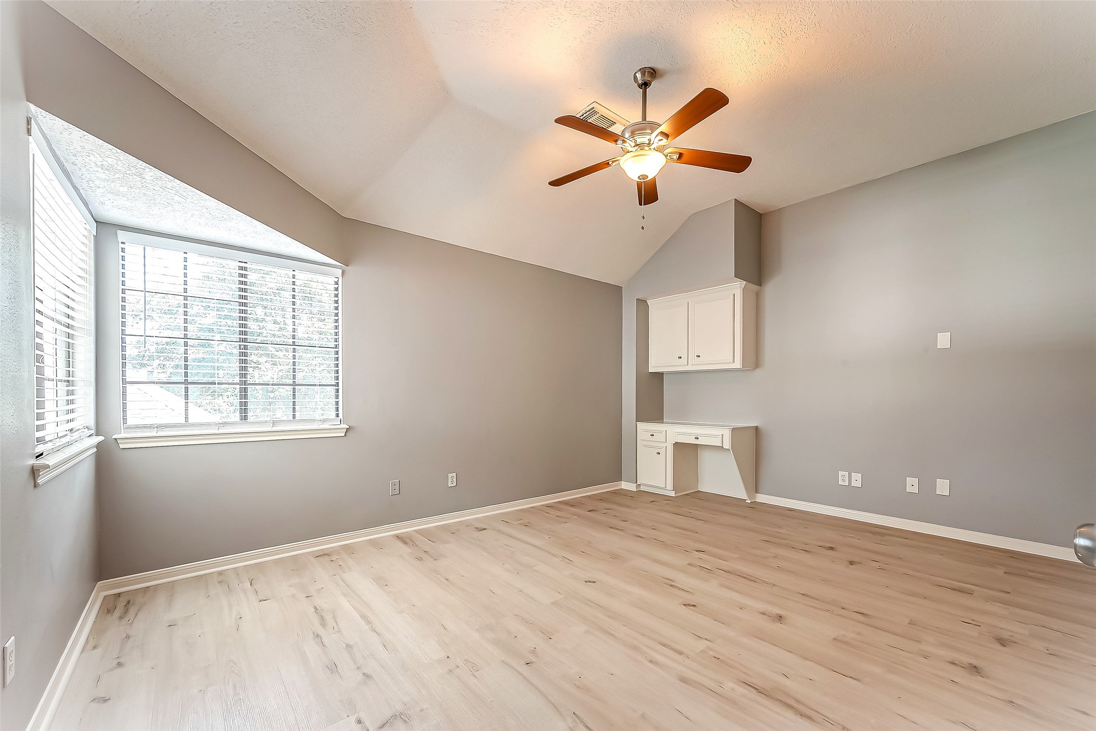 16018 Conners Ace Drive Spring, TX 77379 - Photo 33 of 47 a view of empty room with wooden floor and fan