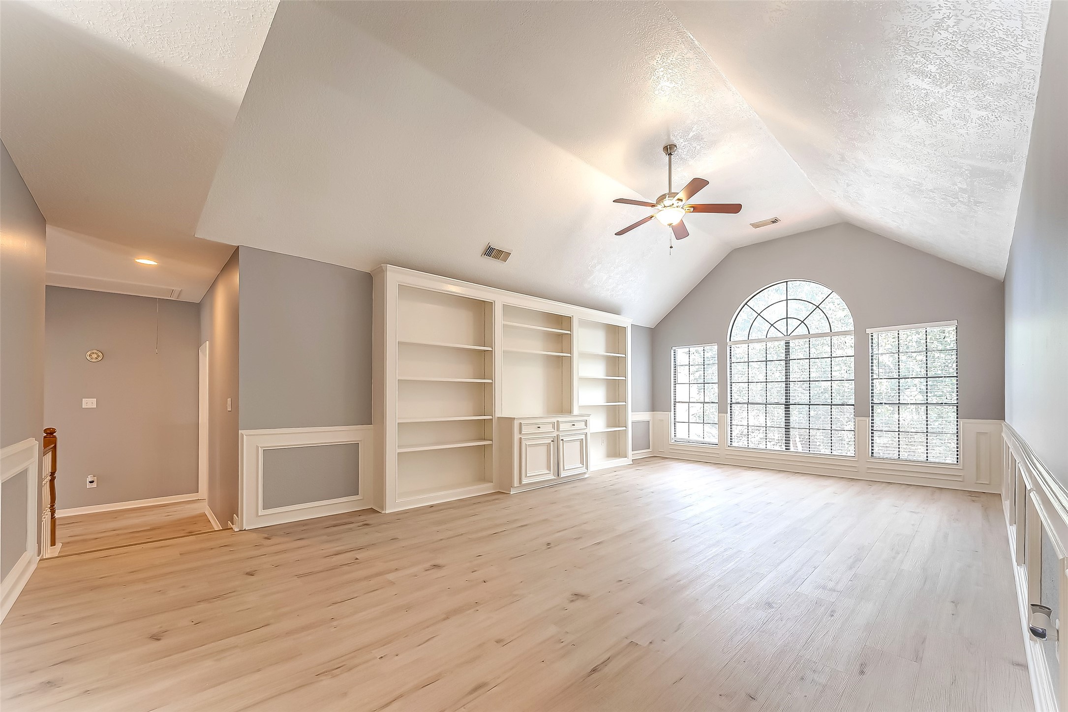16018 Conners Ace Drive Spring, TX 77379 - Photo 38 of 47 a view of an empty room with a window and wooden floor