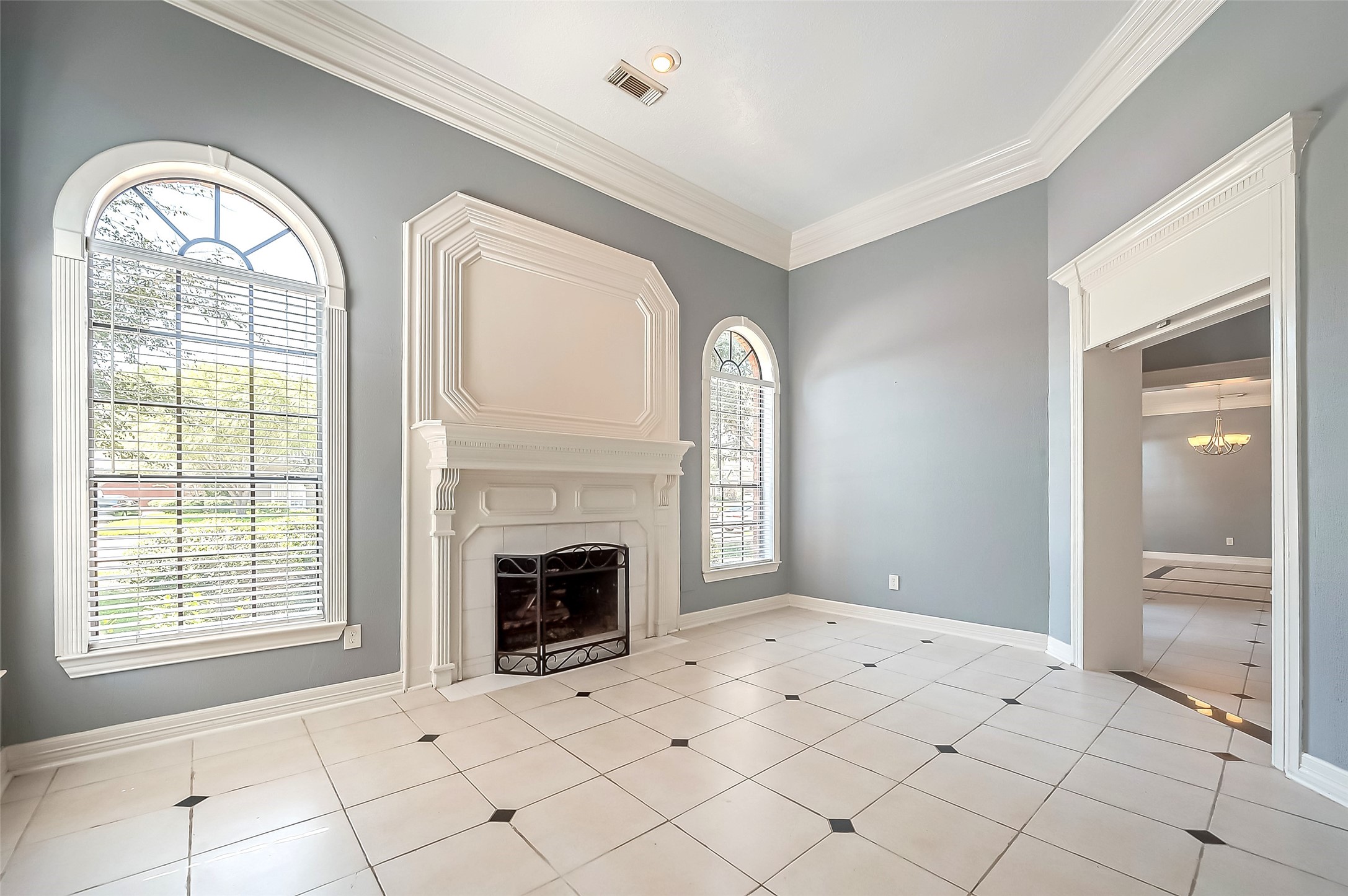 16018 Conners Ace Drive Spring, TX 77379 - Photo 9 of 47 an empty room with windows dryer and way to kitchen