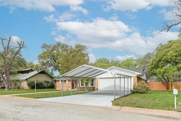 front view of a house and a yard