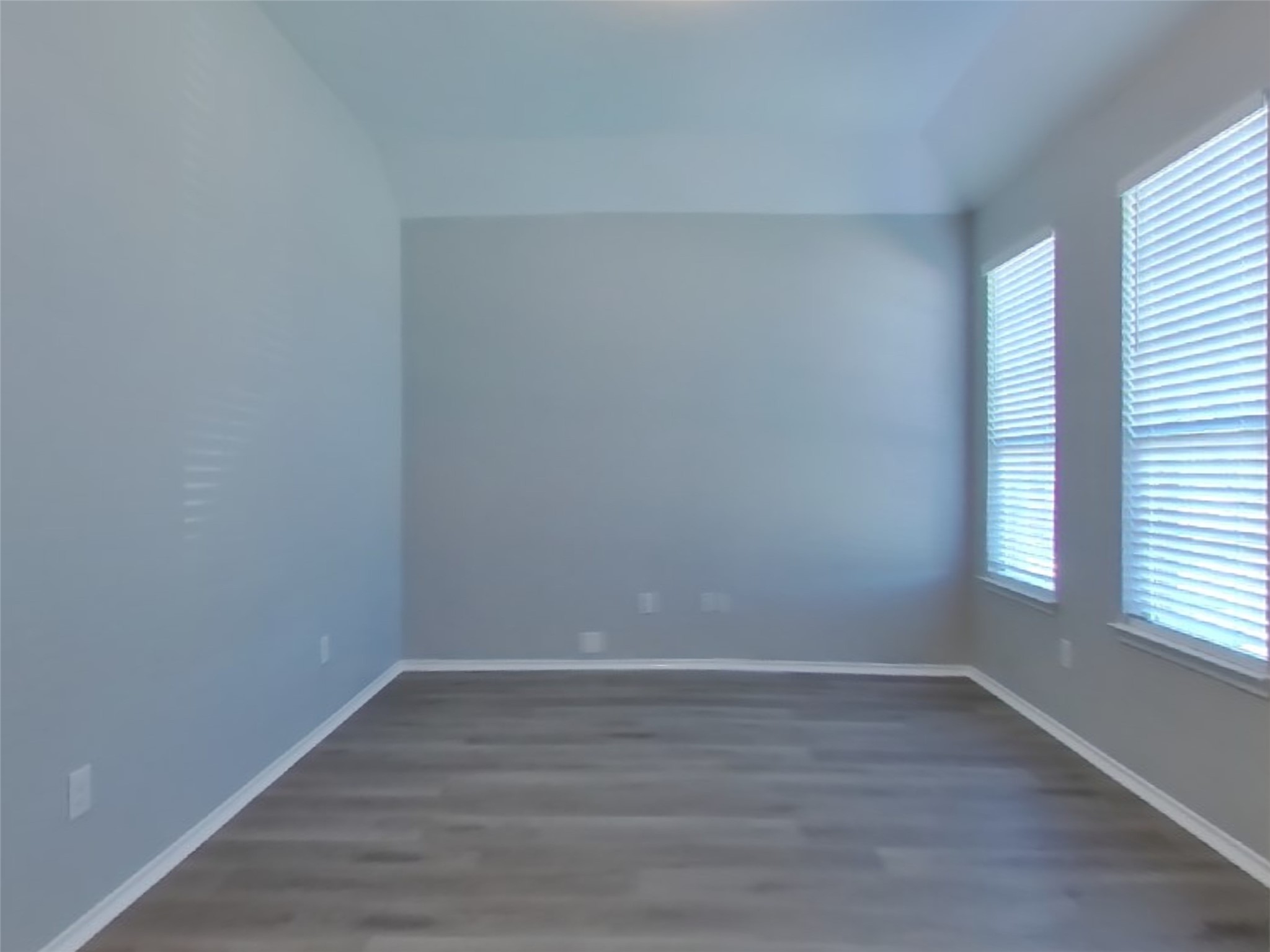 1937 Briar Grove Drive Conroe, TX 77301 - Photo 4 of 18 a view of an empty room with wooden floor and a window