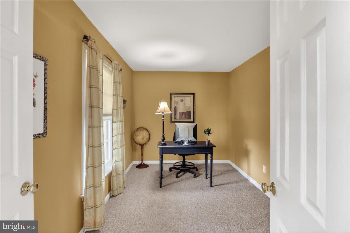 2 Parkside Drive Elverson, PA 19520 - Photo 9 of 39 a view of a hallway with furniture and a window
