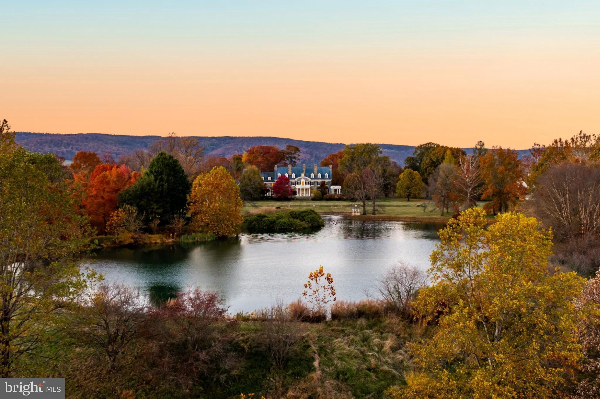 21846 Trappe Road Upperville, VA 20184 - Photo 1 of 50 a view of lake with mountain