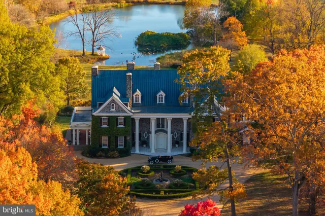 a view of hall way with furniture