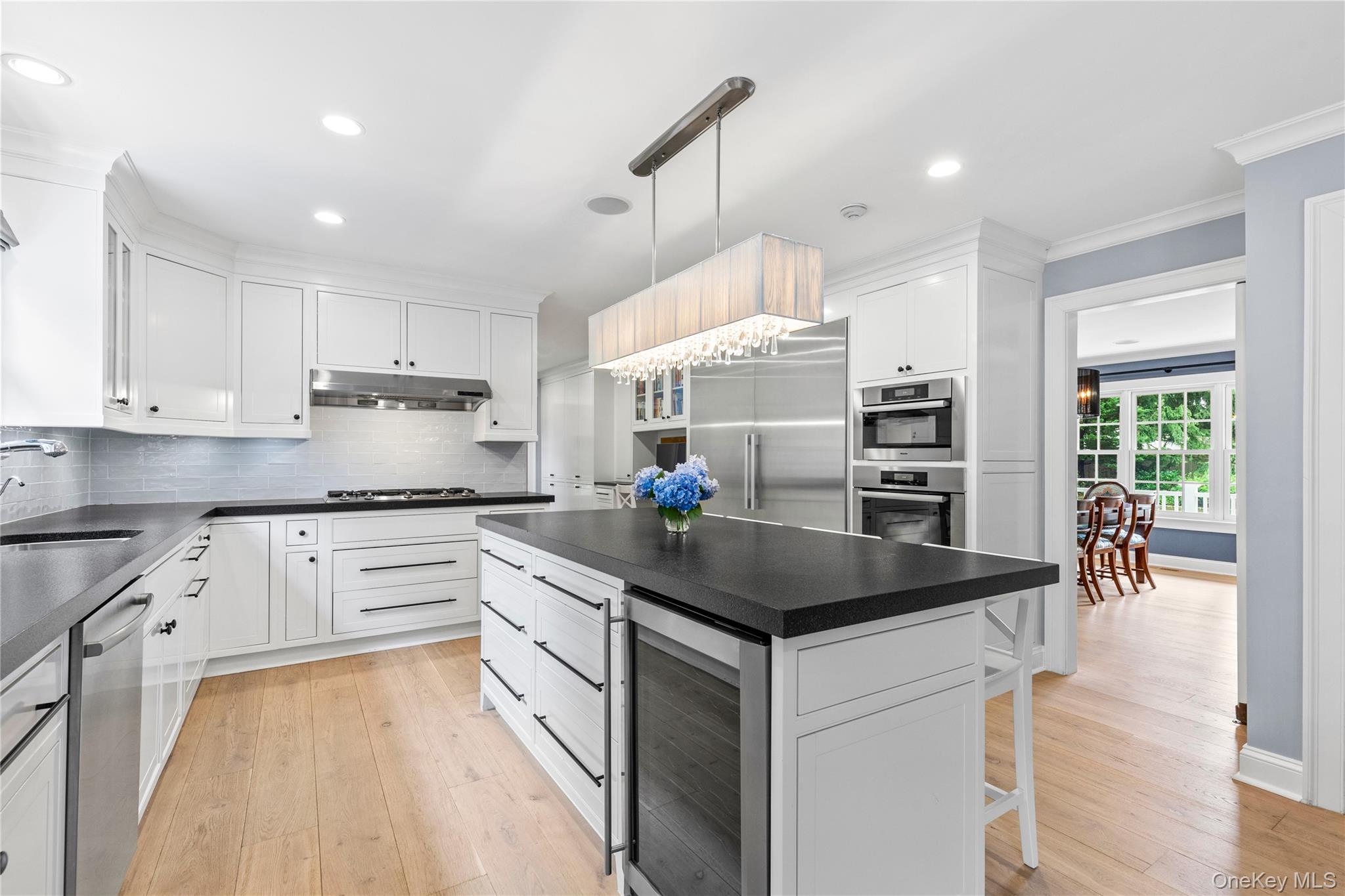 394 Park Avenue Rye, NY 10580 - Photo 9 of 36 Crisp white cabinetry with easy access to the DR