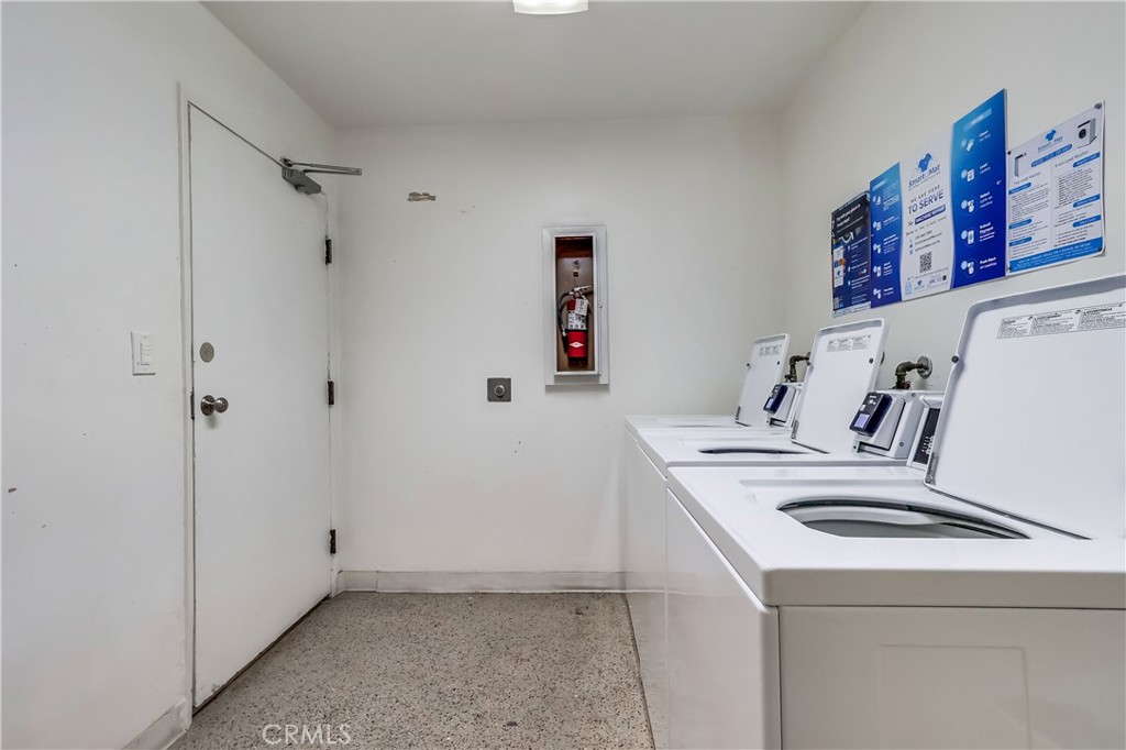 5585 Pacific Coast Highway, Unit 140 Long Beach, CA 90804 - Photo 45 of 47 a utility room with dryer and washer