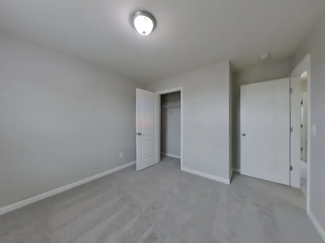 an empty room with an entryway