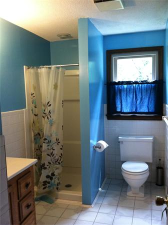 217 Morgan Road West Springfield, MA 01089 - Photo 10 of 25 a bathroom with a toilet a sink and mirror