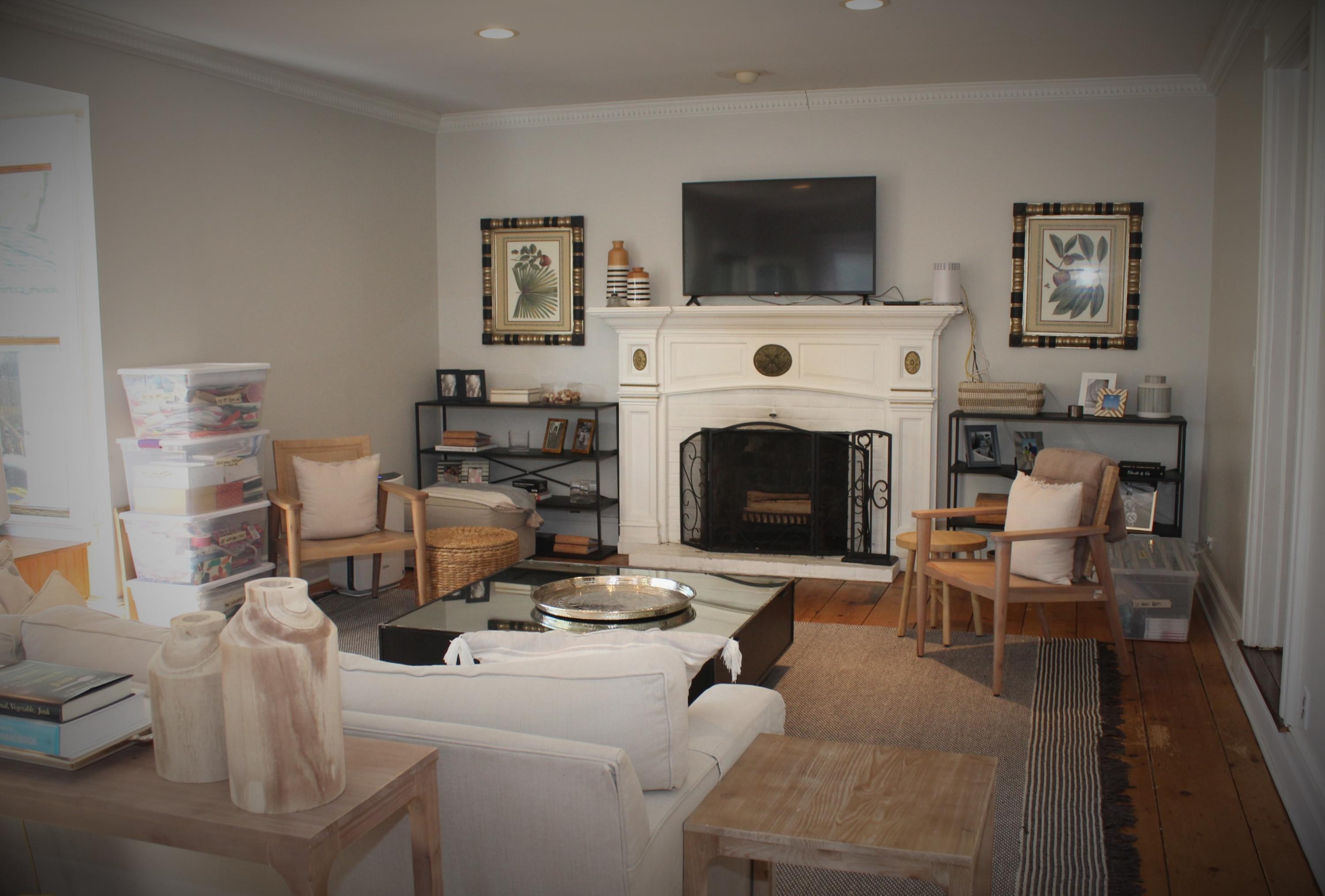 675 River Road Fair Haven, NJ 07704 - Photo 3 of 36 a living room with furniture a flat screen tv and a fireplace