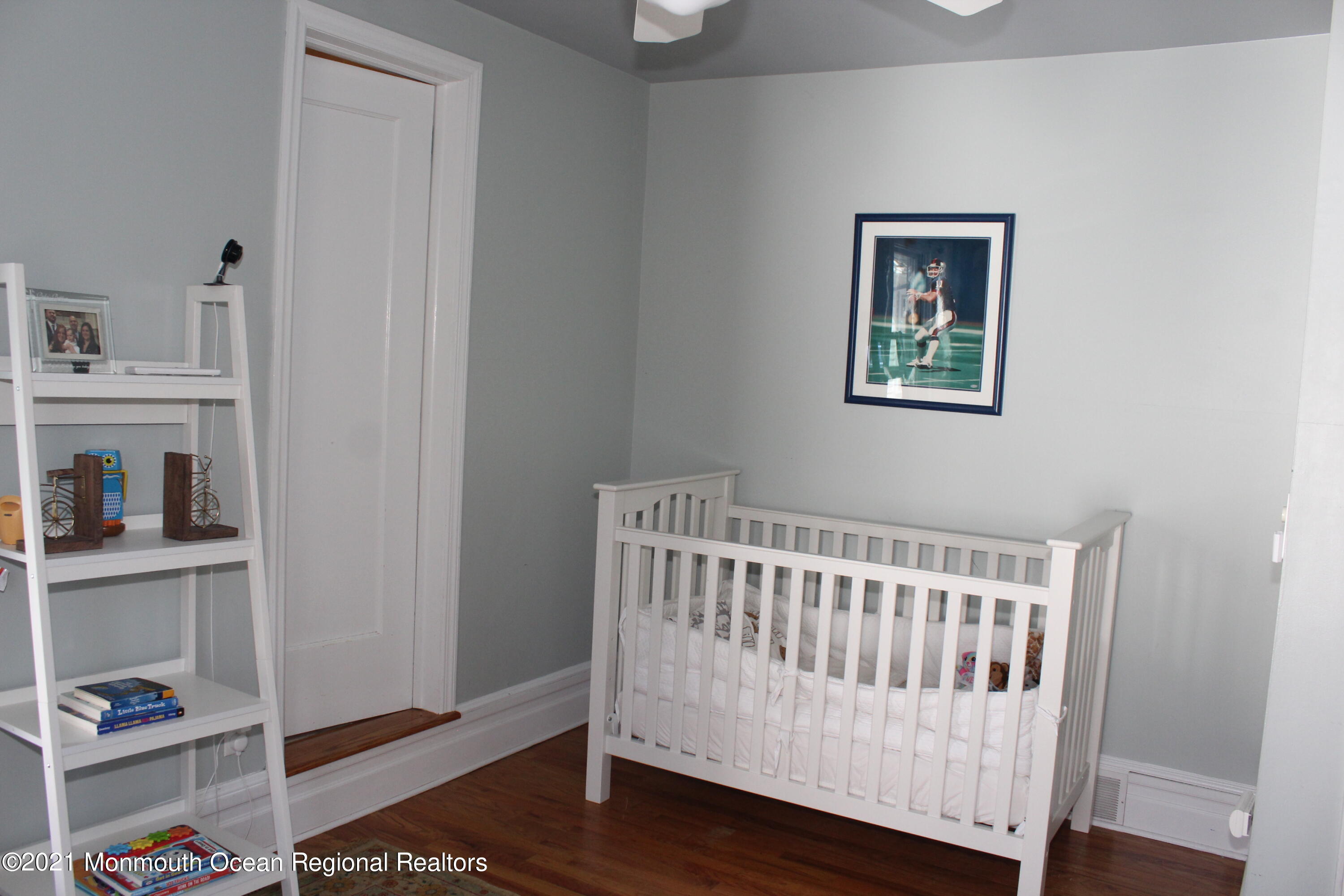 675 River Road Fair Haven, NJ 07704 - Photo 21 of 36 a view of bedroom with baby crib and baby crib