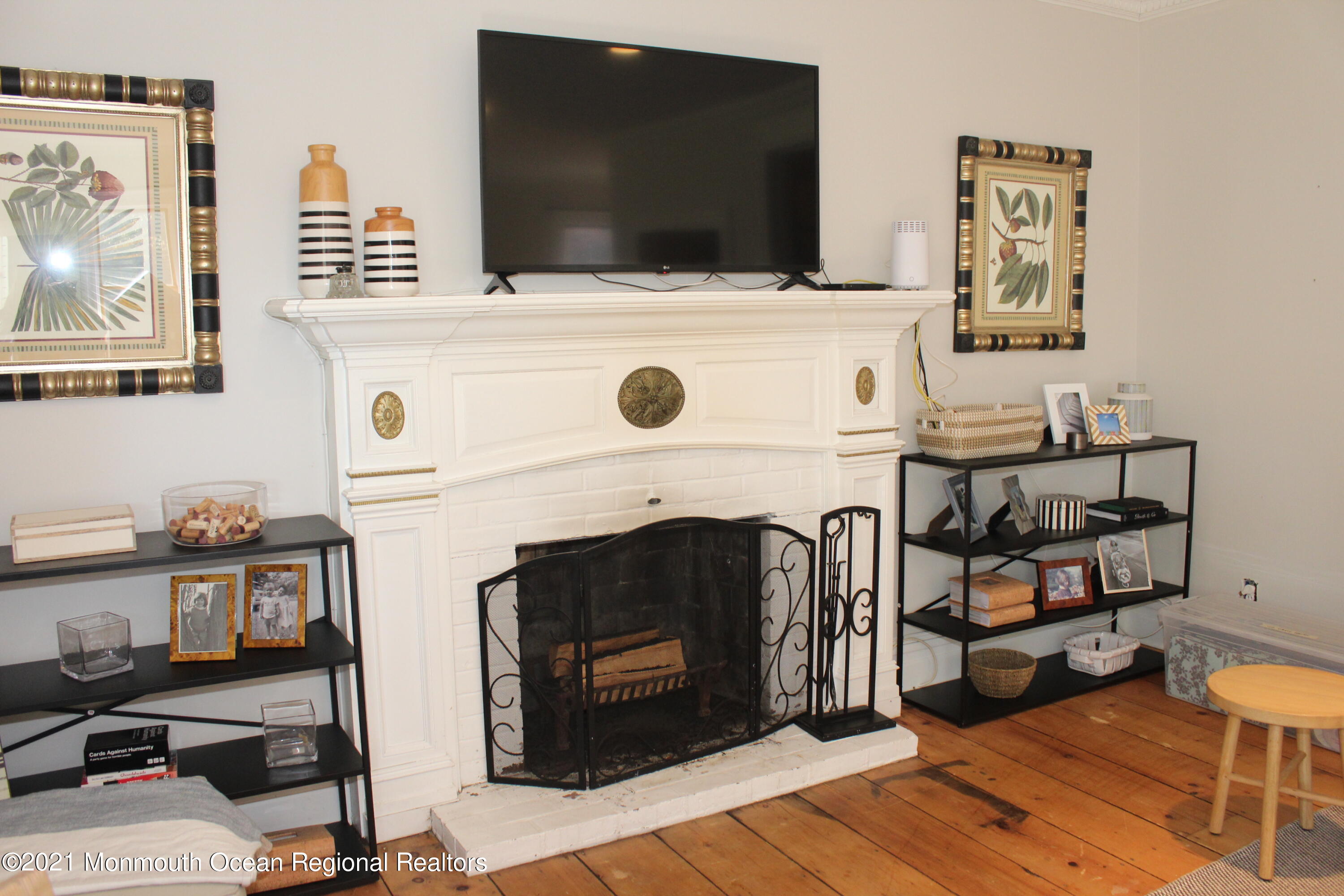 675 River Road Fair Haven, NJ 07704 - Photo 4 of 36 a living room with furniture and a fireplace