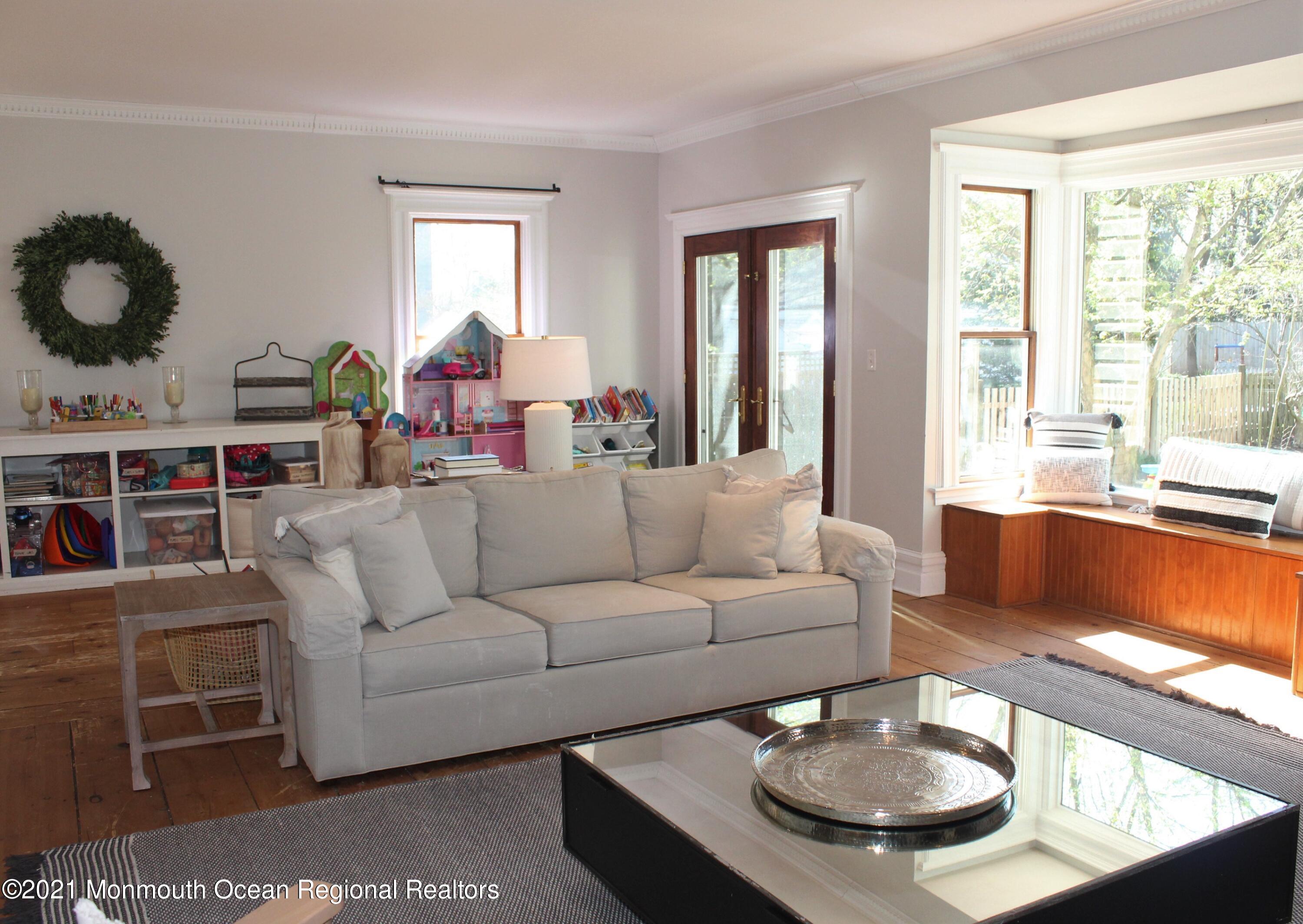 675 River Road Fair Haven, NJ 07704 - Photo 5 of 36 a living room with furniture and a large window